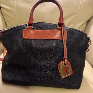 Dooney and Burke black and brown leather purse in excellent shape
